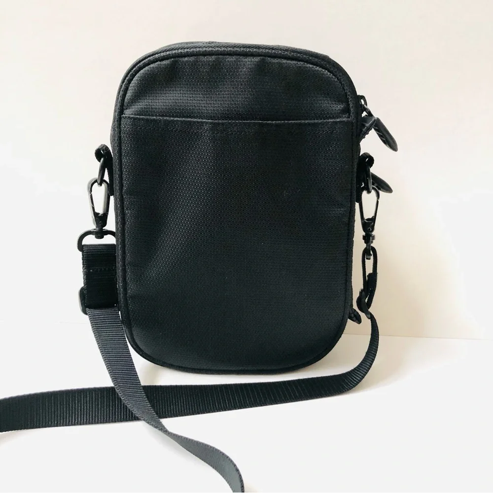 TUMI Leather & Canvas Unisex Shoulder Bag, Gently Used.